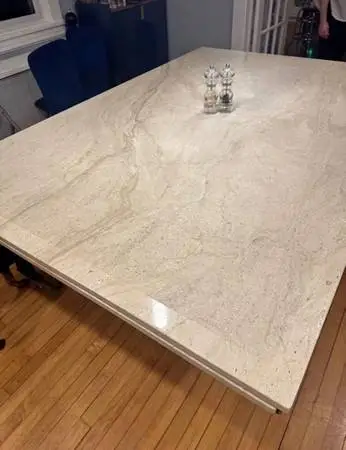 Travertine expandable table with brass heart pedestal