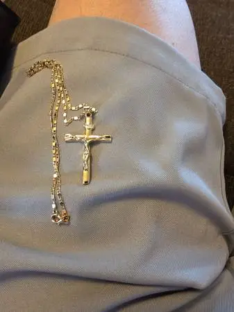 CROSS NECK LESS NEW CONDITION