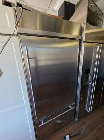 Ge monogram 36 stainless Built-in bottom freezer refrigerator 1 year