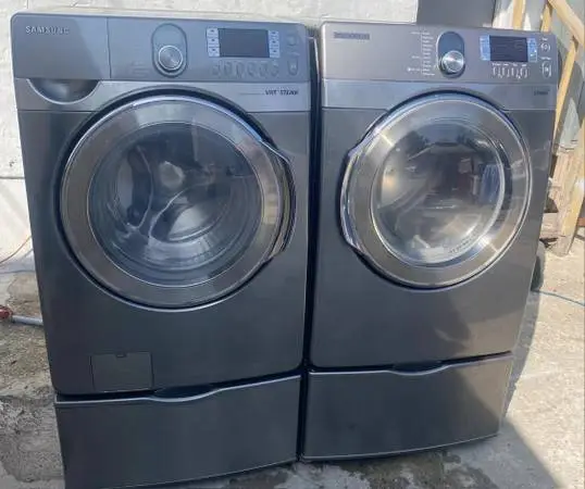 Samsung steam grey front load washer and gas dryer pedestal