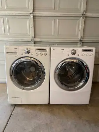 LG heavy duty front load washer and gas dryer set