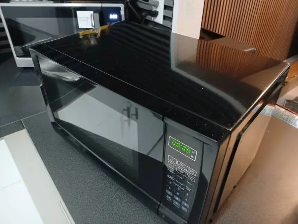 like new insignia microwave black color paid$80