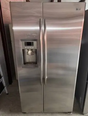 GE Stainless Steel Refrigerator And Freezer