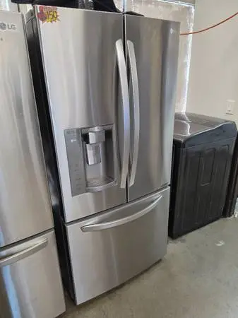 Lg 33 stainless steel compact French door refrigerator ice and water