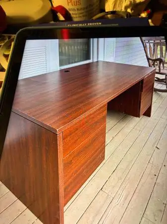 Desk with computer holes