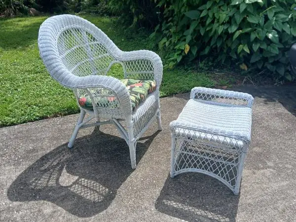 WHITE WICKER ARMCHAIR, CUSHION AND OTTOMAN