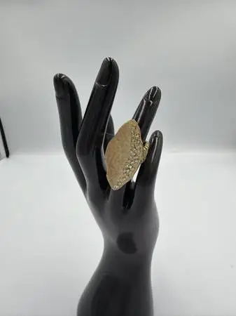 Gold-tone textured leaf cocktail stretch ring