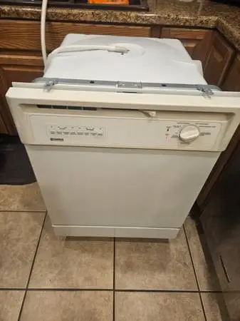24 Kenmore builtin Dishwasher, front button, tough analog mechanical,