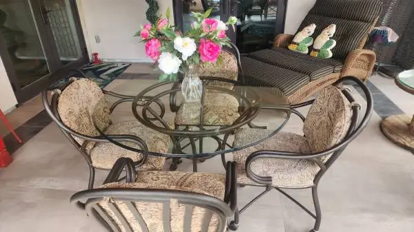 Glasstop iron table and chairs