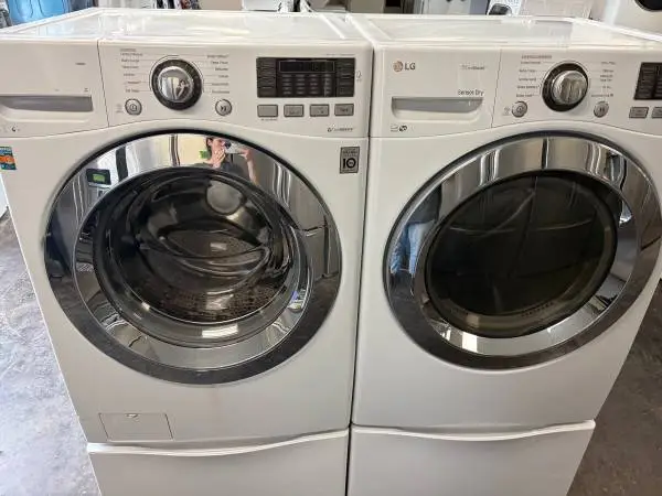 Steam Front Load LG Washer & Dryer Set on Pedestal