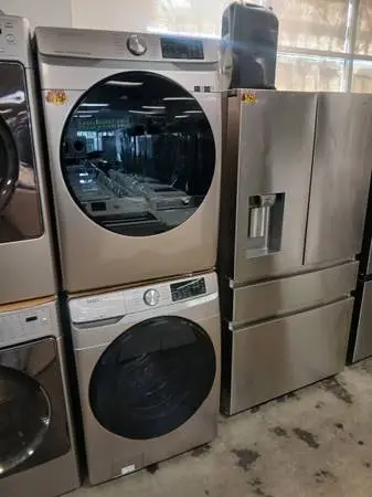 Samsung champagne steam smart front load washer and gas dryer set