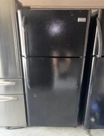 Black Frigidaire Refrigerator And Freezer
