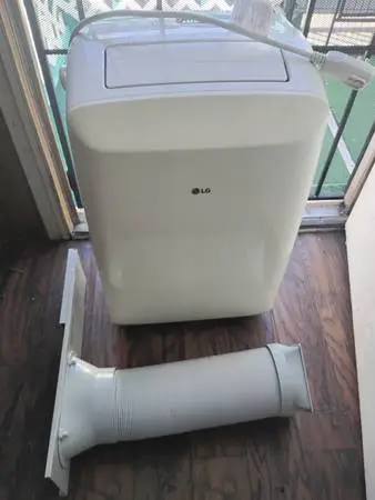 5 months old White AC LG portable air conditioner w/ remote