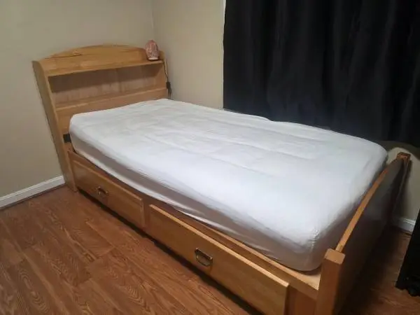 Need gone twin size natural light wood / pine captain’s bed frame in g