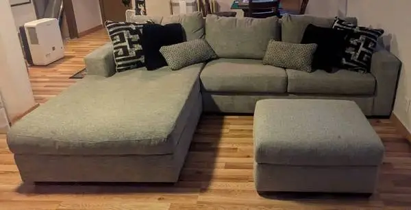 Sectional with Left Chaise Lounge, Ottoman, and Pillows from HOM Furni