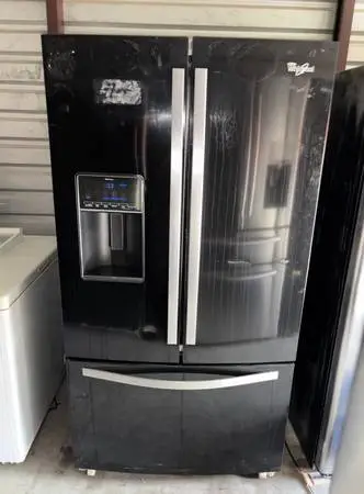 Black Whirlpool Refrigerator And Freezer