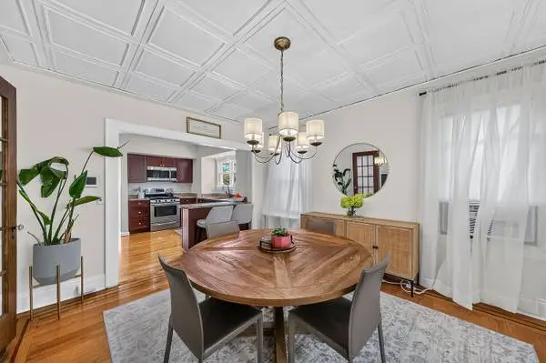 Round Wood Dining Table and 4 Gray Chairs